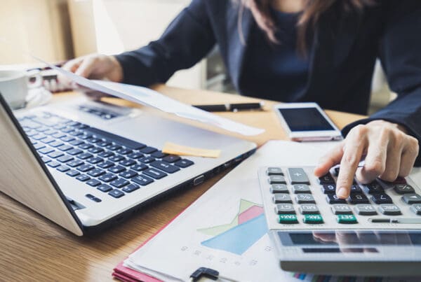 What Do You Need When Applying for a Surety Bond - Businessman Working on Desk Office Business Financial Accounting Calculate